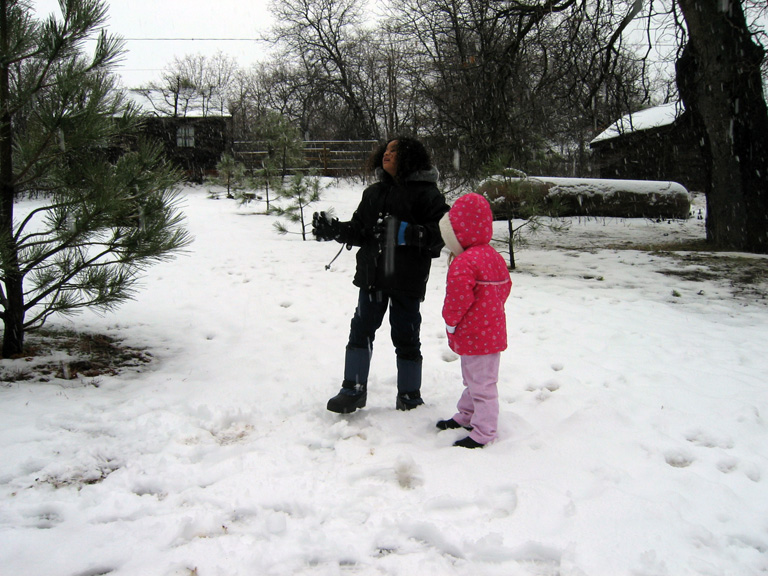 Mari watches the snow fall with Jacque!