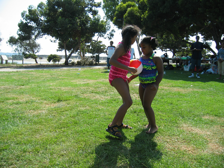 Mari and Tajah are in the water balloon race!