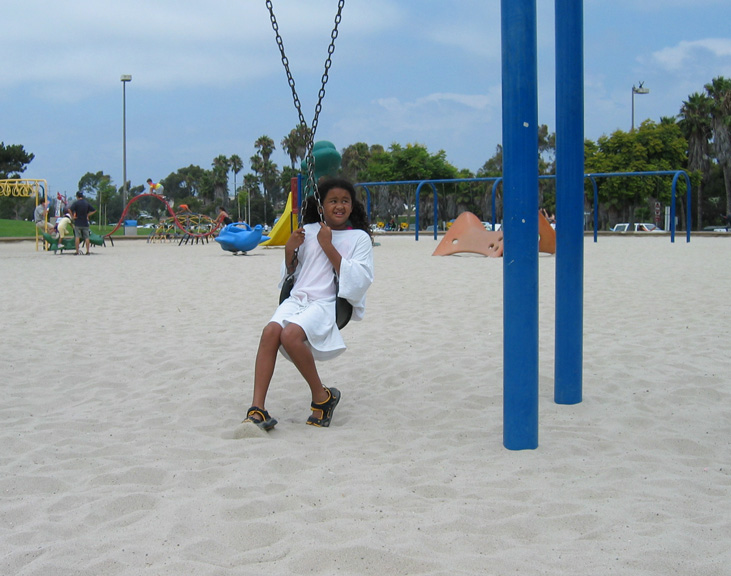 Mari plays on the swings!