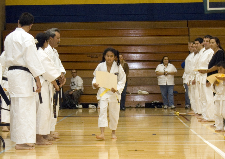 Mari gets her Diploma for the rank of 8th Kyu in Karate and Kobudo!