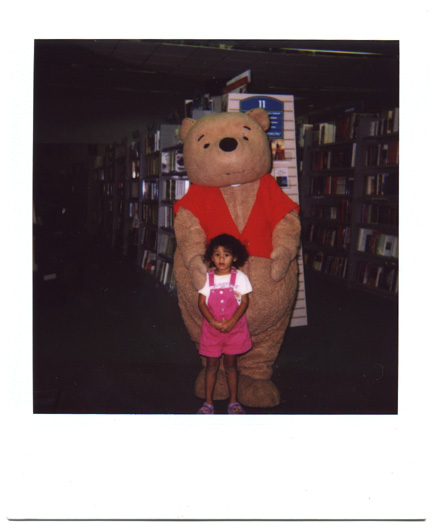 Mari meets Winnie the Pooh at BookStar during storytime!